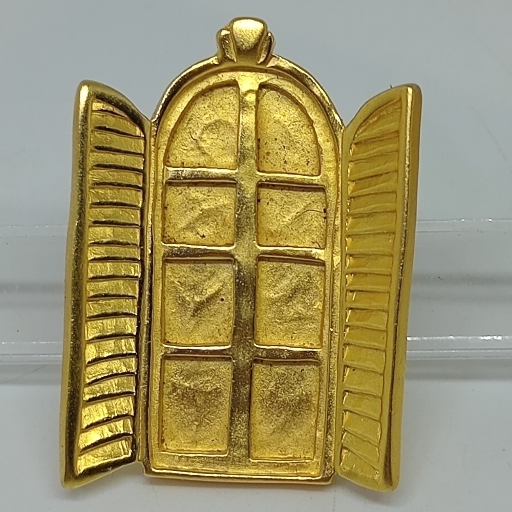 * Karl Lagerfeld window with shutters gold tone pin brooch
